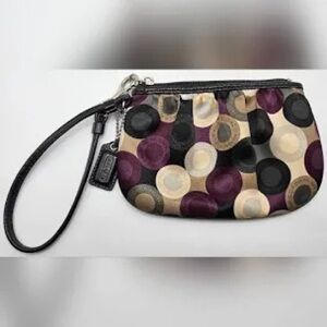 Coach Circle Pattern Wristlet in Black, Purple, and Cream